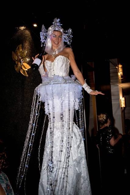 Life's little luxuries - champagne poured by a stilt walker!