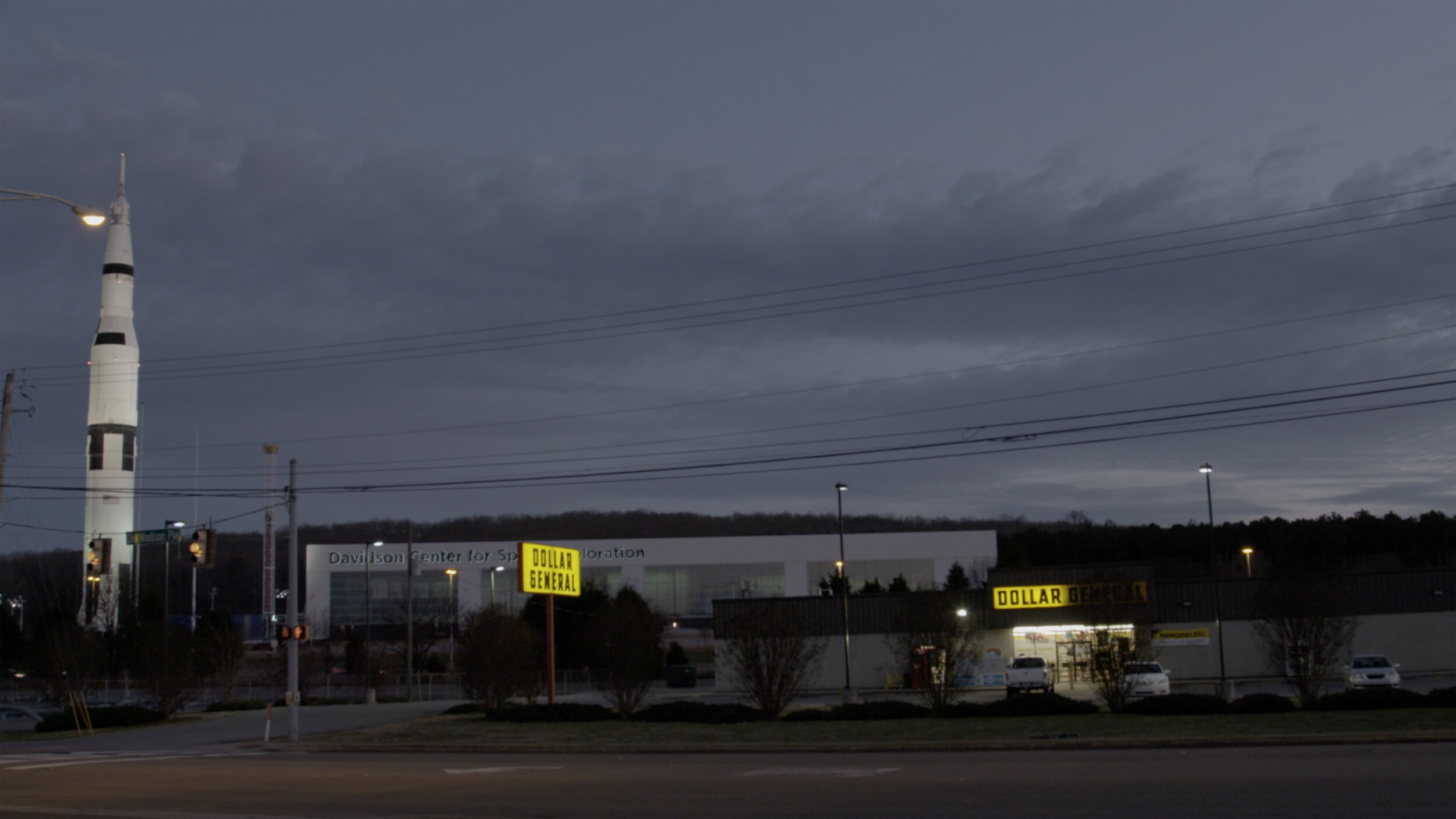 13_WRESTLE_NASA Rocket, a famed Huntsville, Alabama, landmark, next to a Dollar Tree.jpg