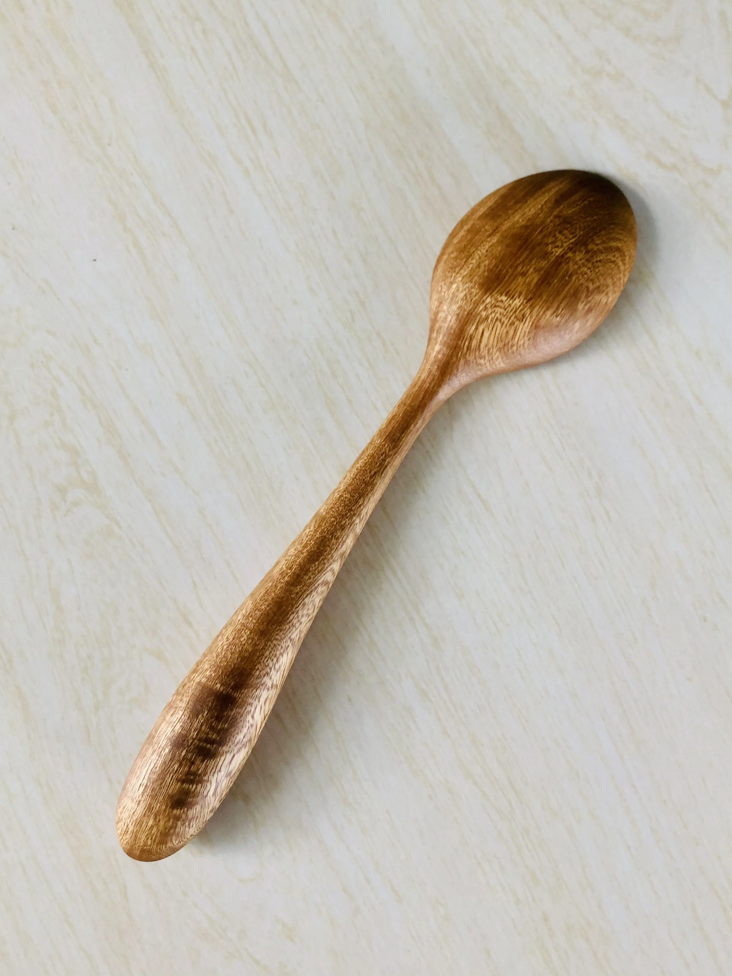hand crafted almond wood spoon side.jpg