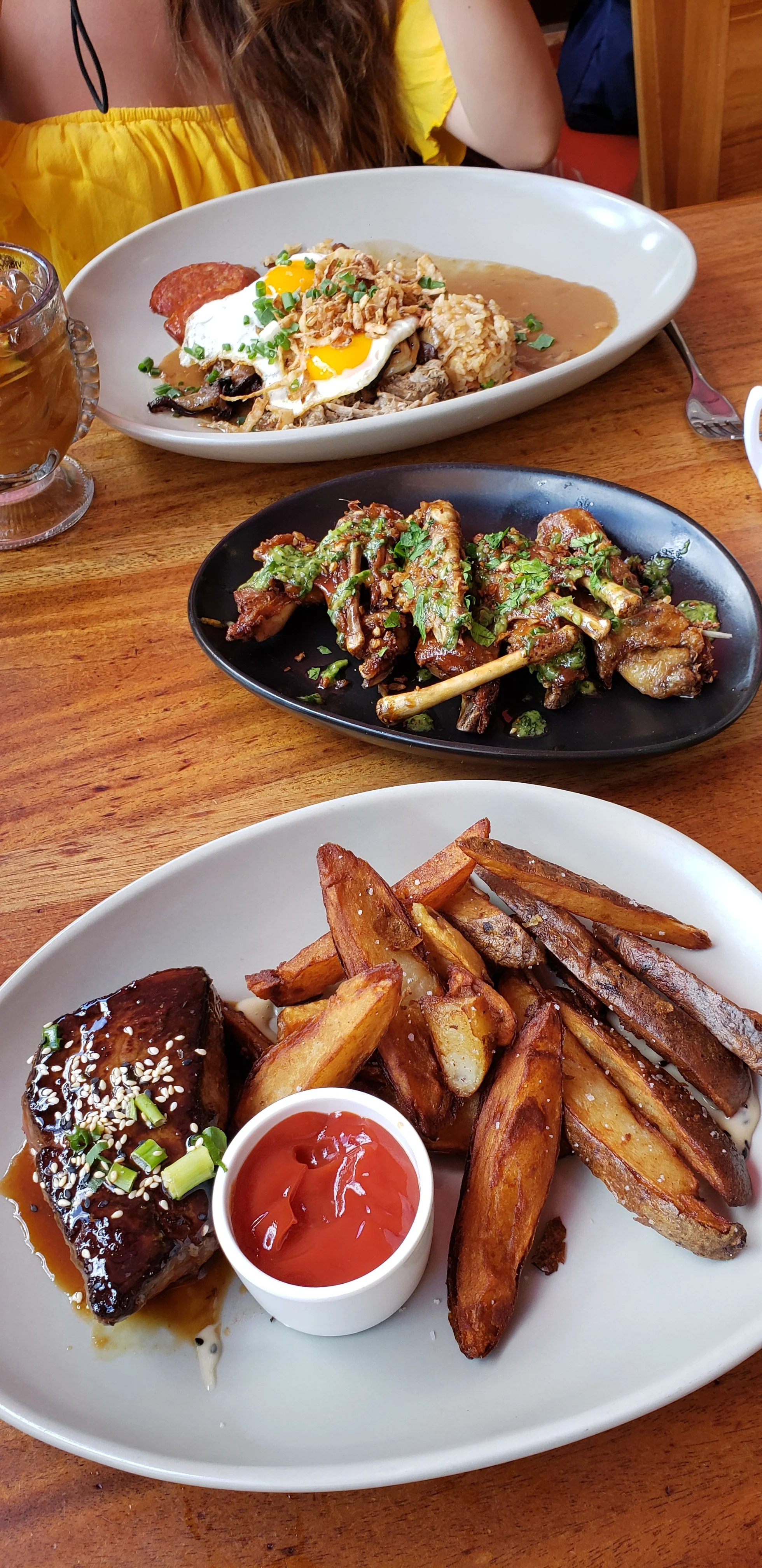 Steak and frites, peking duck wings and a loco moco at the Hula Grill Waikiki.