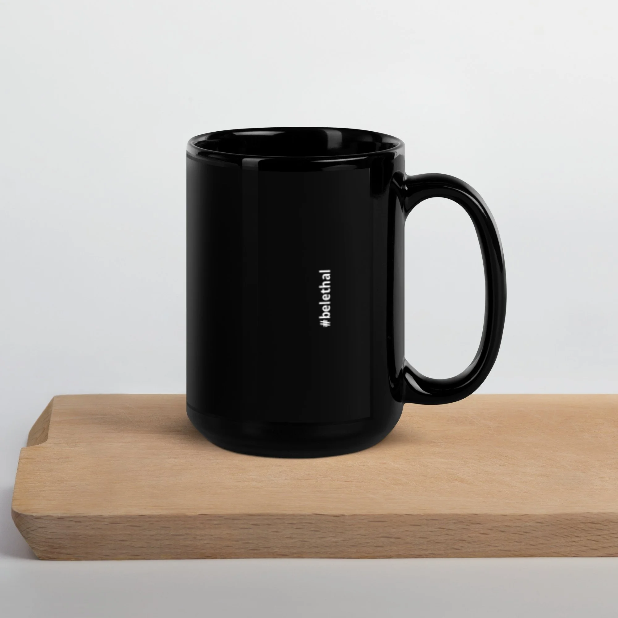 black-glossy-mug-black-15-oz-handle-on-right-699613c195423.jpg