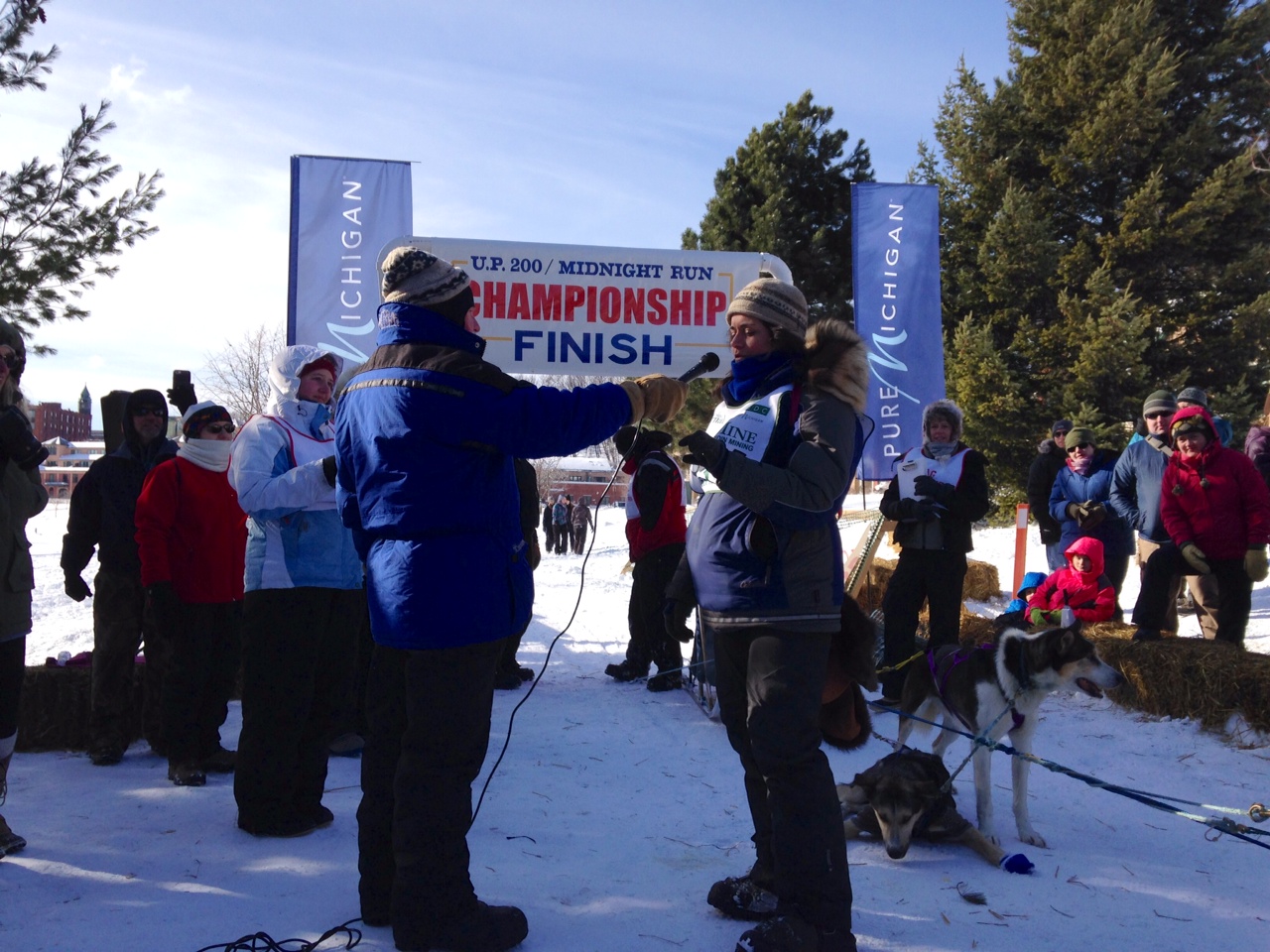 At the finish, being interviewed for the crowd. Taz's happiness is contagious, even in this photo.