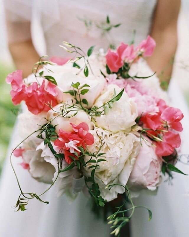 Wedding inspiration with three of my favourites. Gorgeously ruffled peonies, fragrant sweet peas and delicate trails of jasmine. Love this bouquet from my #euphoricflowers days with @vtbflower Image by @annkochweddings