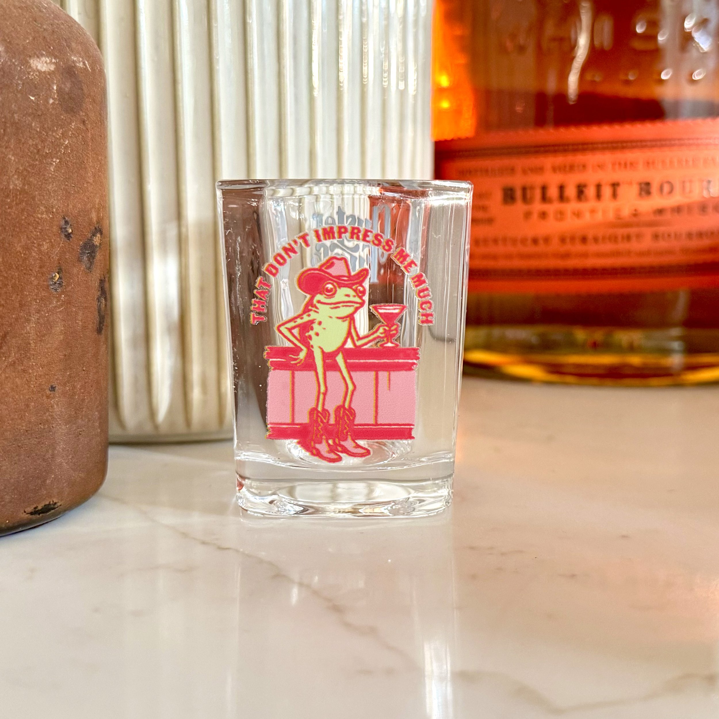 That Don't Impress Me Much Shot Glass 2.jpg