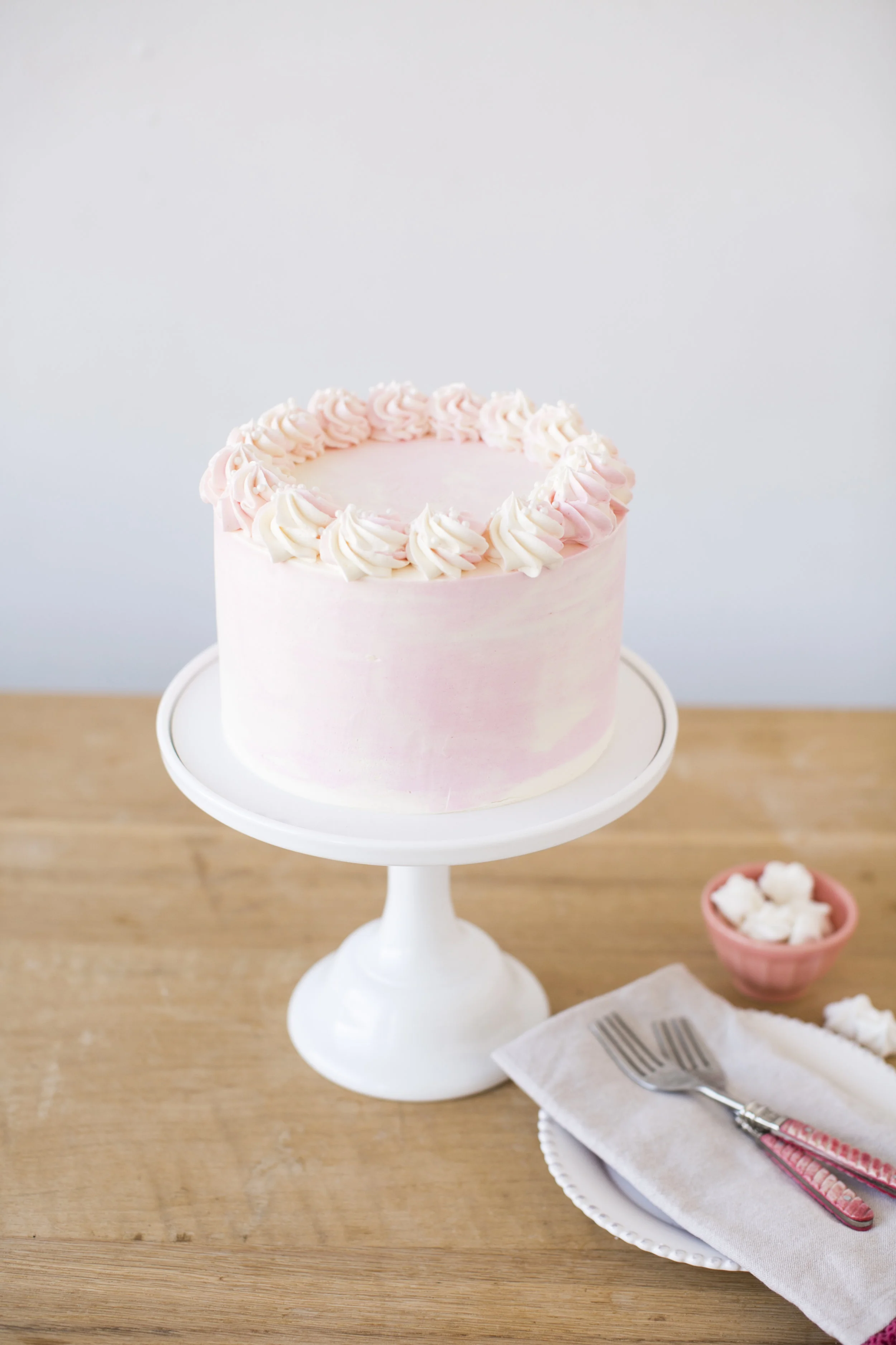 Strawberries & Champagne Pink Champagne cake, strawberry filling and vanilla buttercream $47