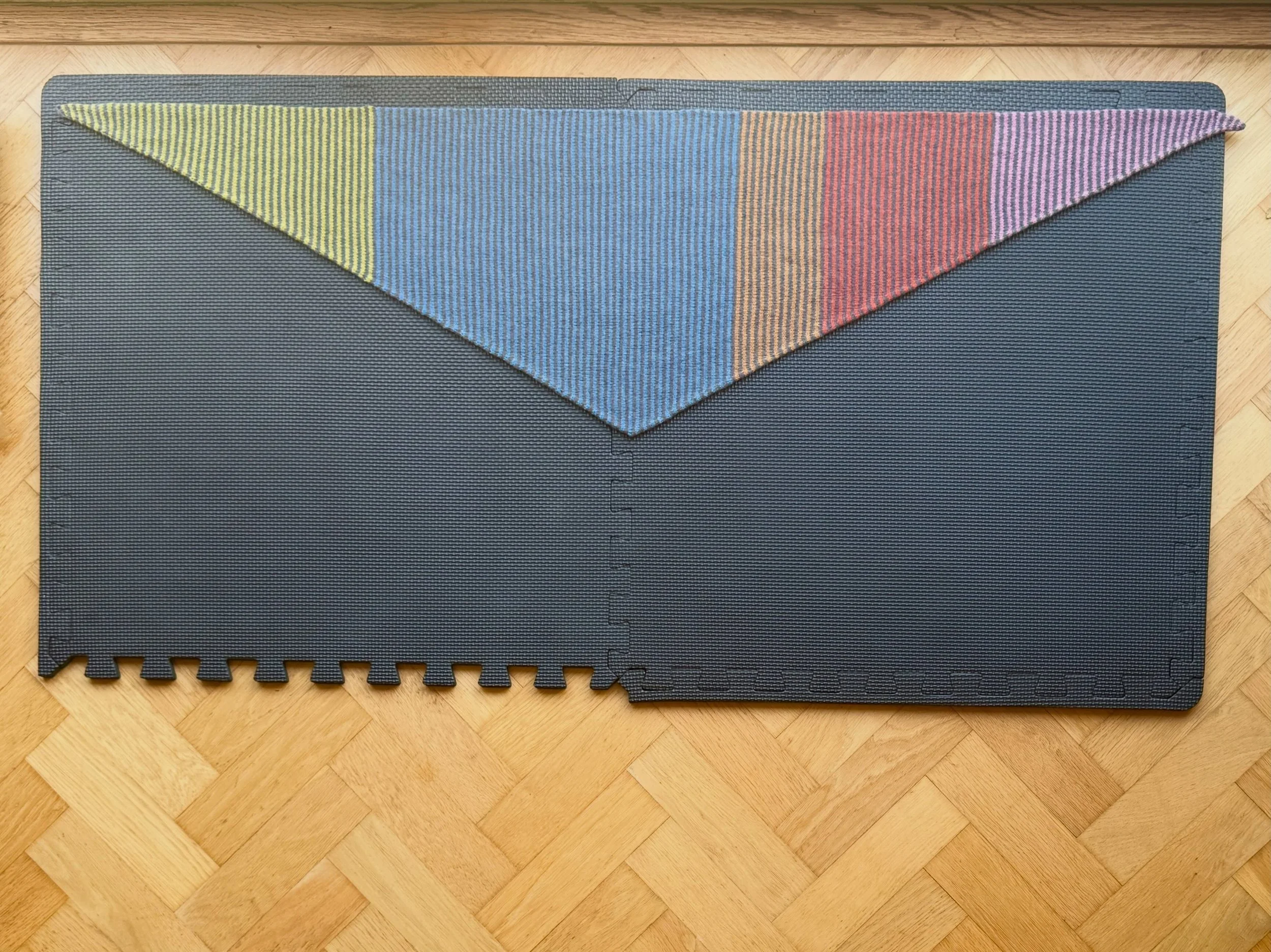 Another triangle scarf, this time with oak galls over dyed with logwood as the main background colour. 

I&rsquo;ve built on this with colours from cochineal, madder, willow, indigo and common reed, bringing together a different combination of natura