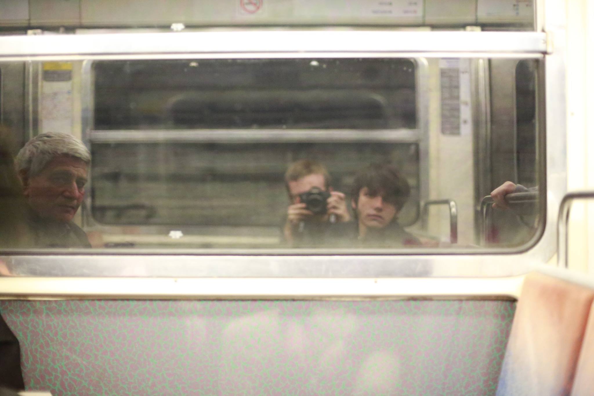 See that reflection? That's my thousand yard stare from all the public transit. Photo by Robert Manor. 