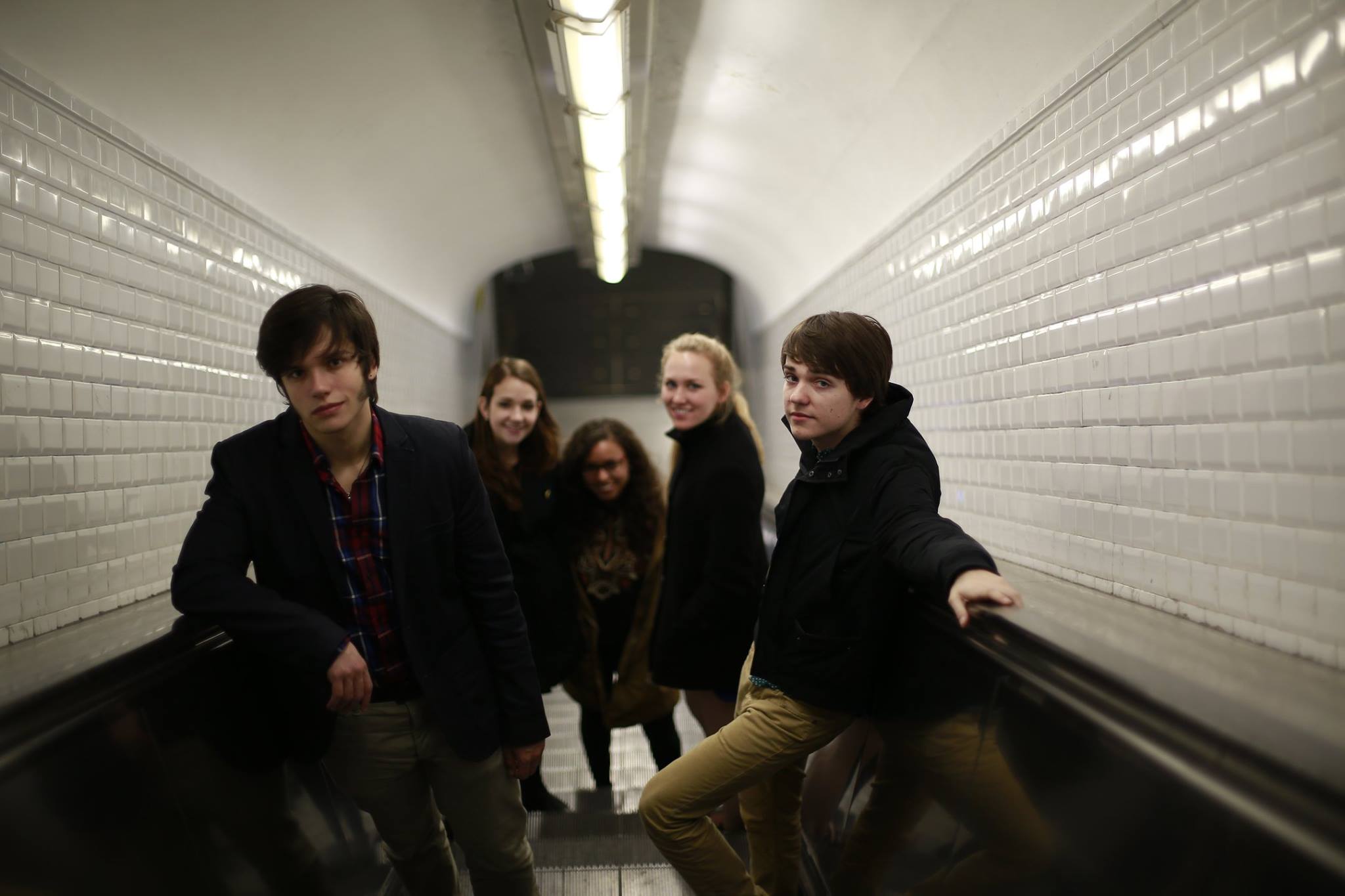 There is an upside of riding the metro at night: opportunities to look cool. Photo by Robert Manor.