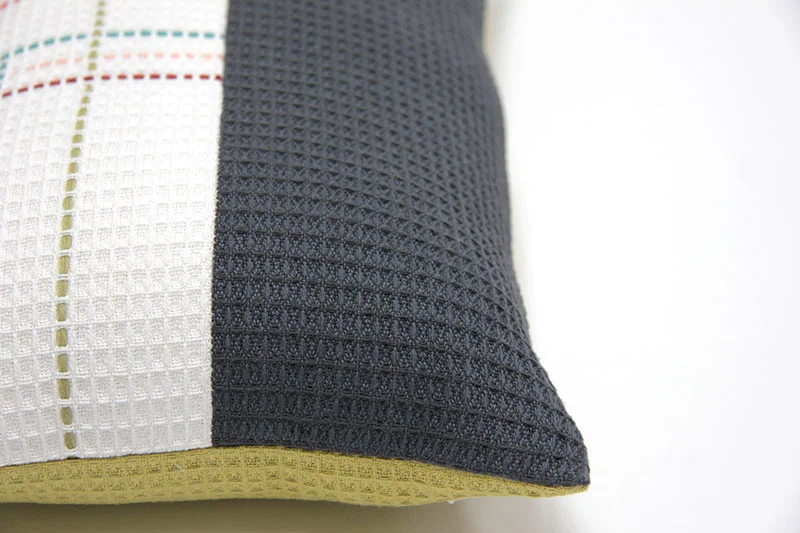 Hand embroidered organic cotton navy and white rectangle cushion