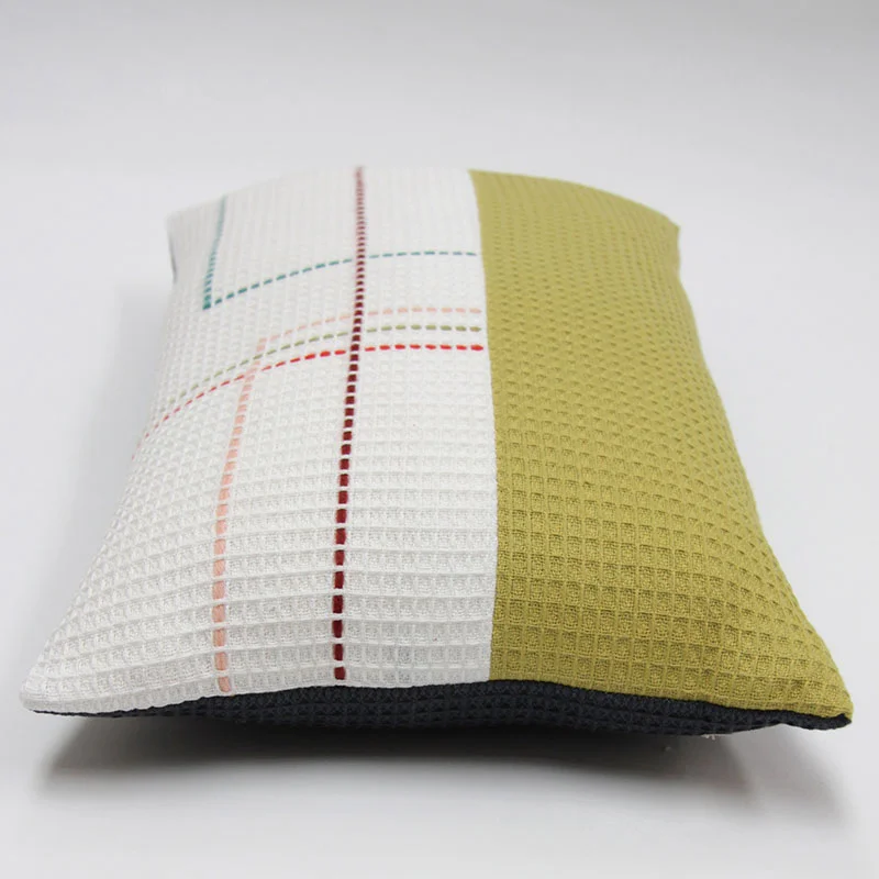 Hand embroidered organic cotton olive and white rectangle cushion