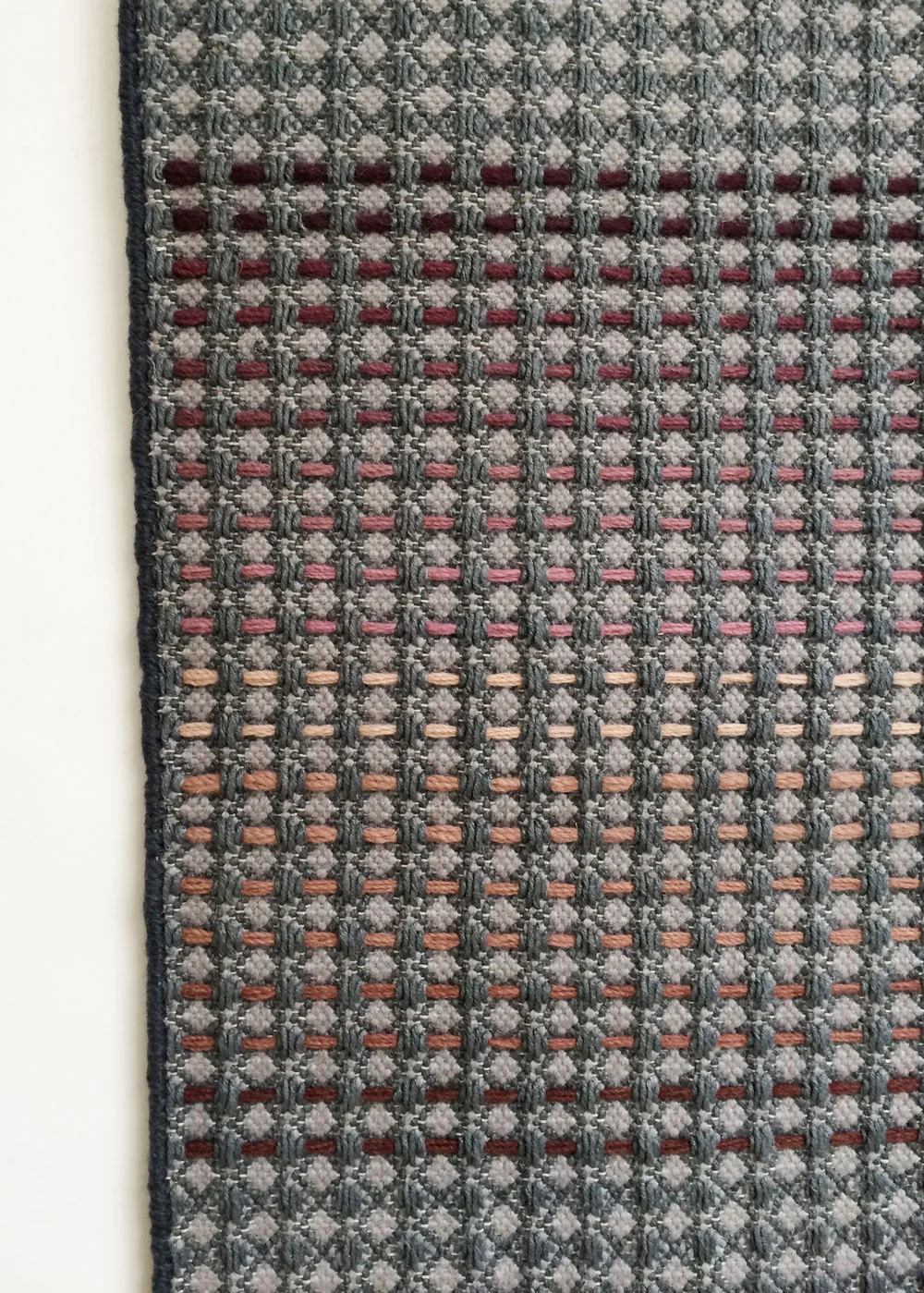 Plum rust embroidery stripe close up