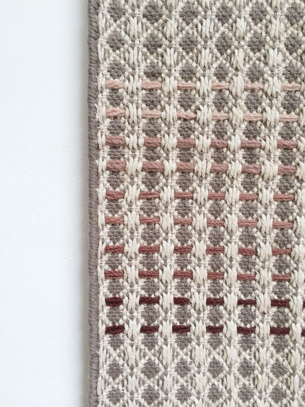 Rust hand embroidery close up detail