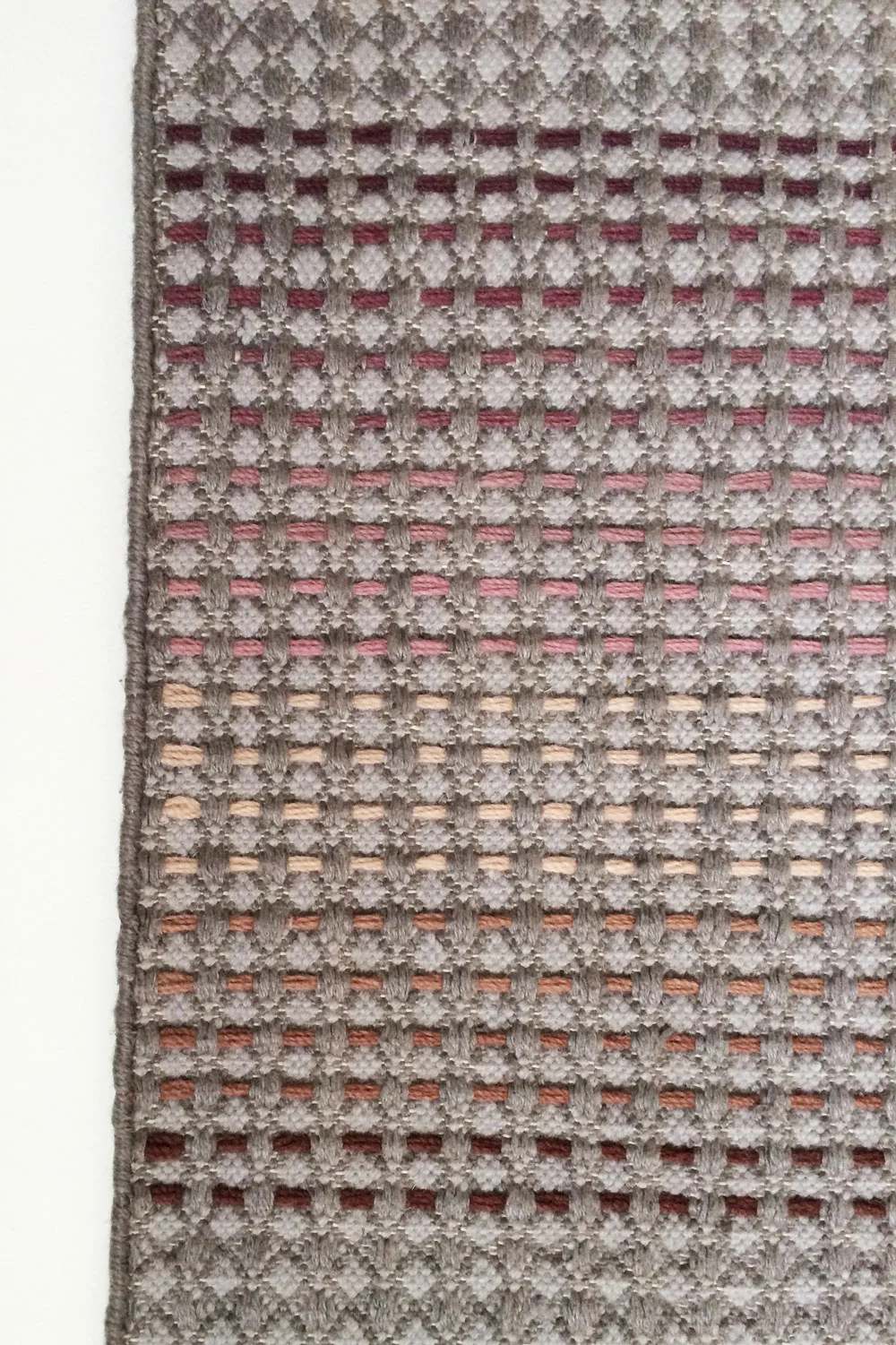 Plum rust hand embroidery stripes close up detail
