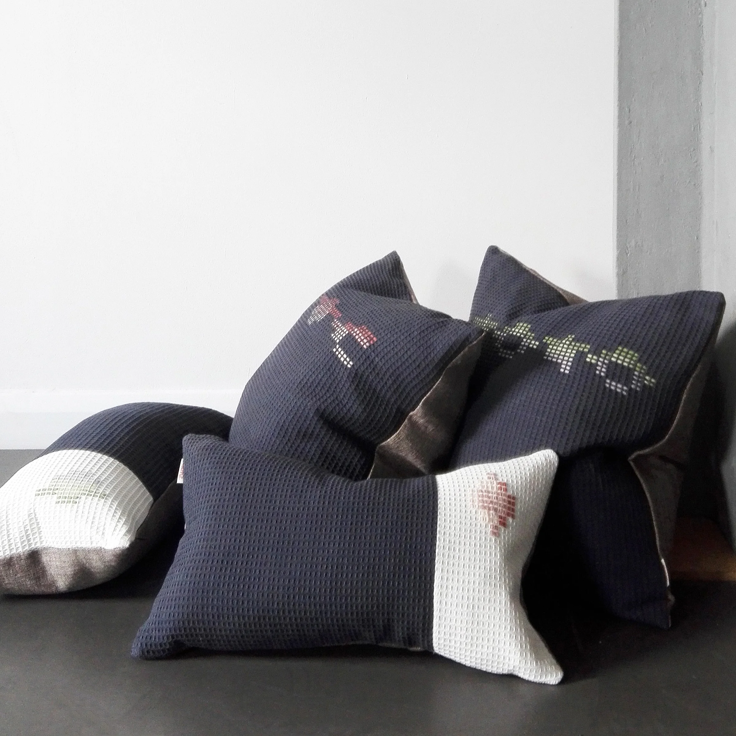 Navy and white hand embroidered organic cotton cushion collection