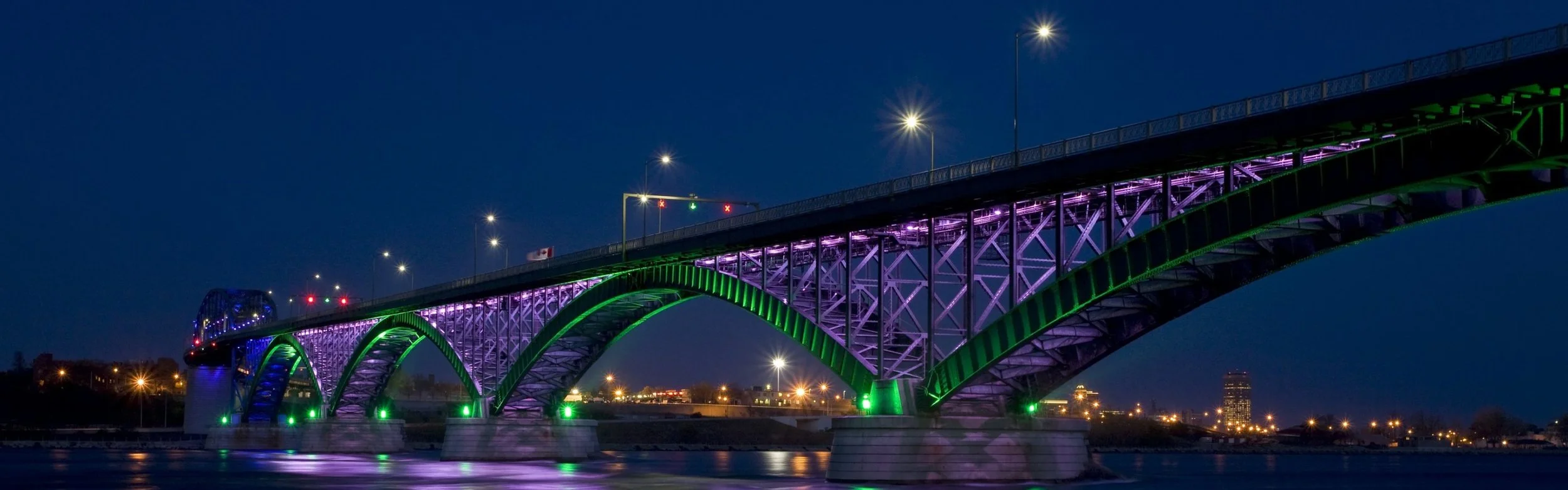 The Peace Bridge connects the city of Buffalo to the beautiful and friendly Town of Fort Erie . Check the Peace Bridge Authority 's website for wait times and ID requirements .