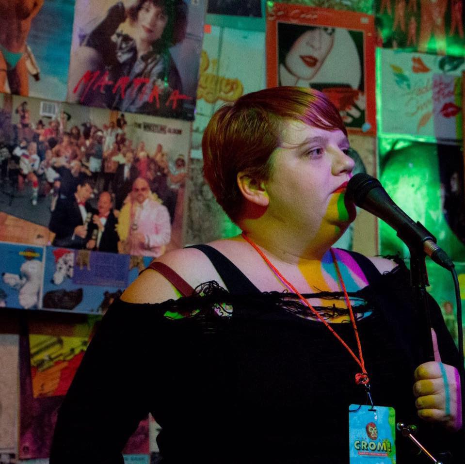 Rana May was persuaded to try stand up comedy after doing “informational speeches” at backyard barbeques and in basements for a year or two. Her background is in booking illegal warehouse punk shows, social work, dog rescue, and used book stores -- where deadpan is considered a strength. Her stand up is sometimes weird, pragmatic, and whimsical and nobody has ever said she reminded them of anyone. Rana has been featured locally in the City Pages, Star Tribune, Minnesota Daily, MPR, and was picked as one of five Minnesotan comics to watch in 2016 by Growler Magazine. You can see her performing all over the Twin Cities producing and hosting Donut Party! Open Mic. You could also catch her performing as a cast member for Boy Kisses Comedy Show. She’s opened for Maria Bamford, Kyle Kinane, Jonah Ray, Mary Mack, Tim Harmston, Neil Hamburger, and others. Rana has performed on the Meltdown and in the Bridgetown Comedy Festival, Crom Comedy Festival, Chicago Comedy Exposition, and Hell Yes Fest.