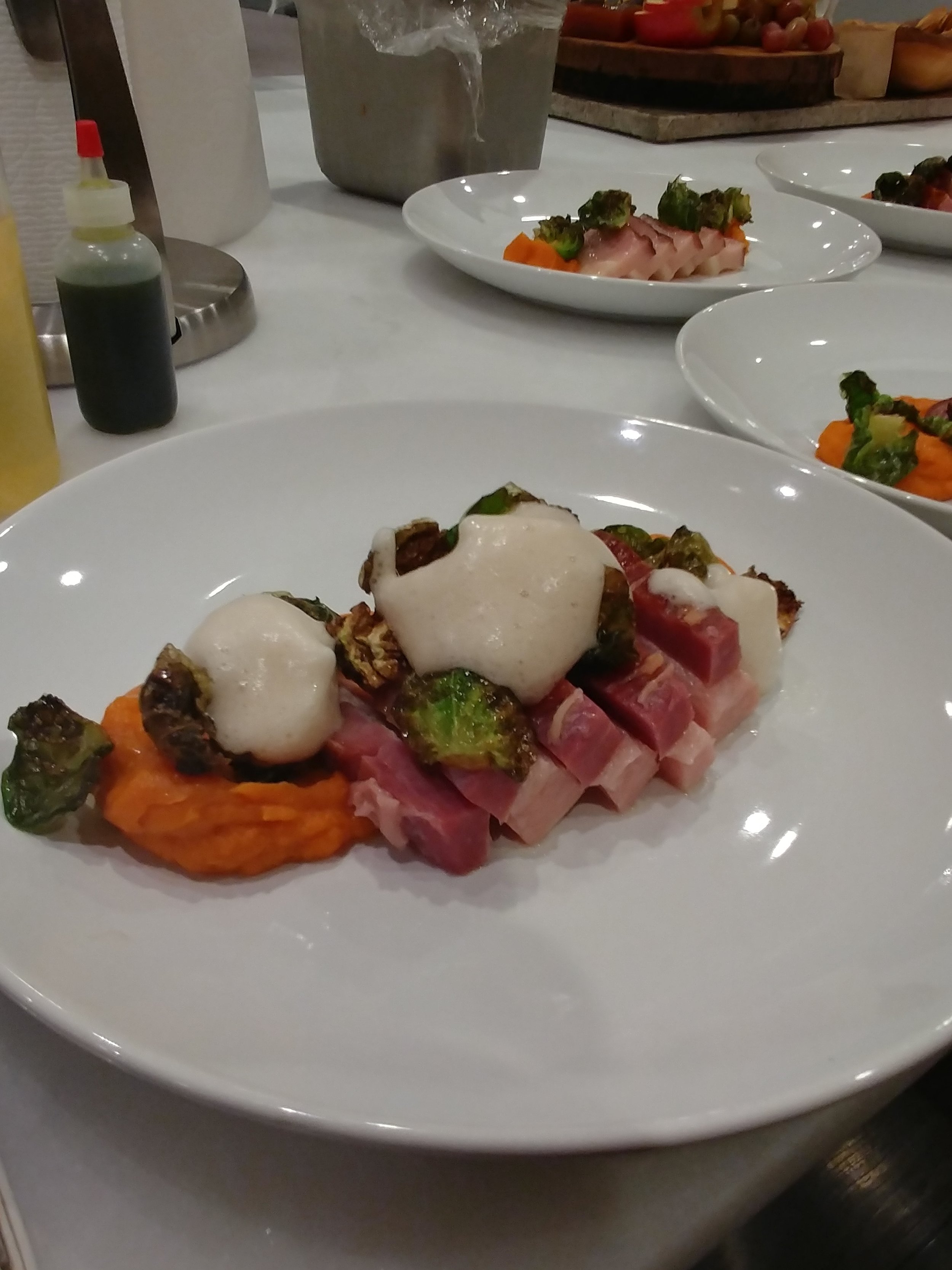  24hr. SOUS VIDE BACON Yam puree, Crispy Brussels Sprout Leaves, Spiced Cider - Rose Water Foam