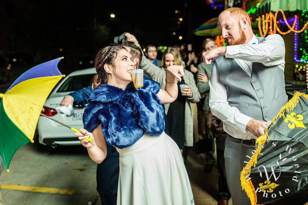 Pro-Level #OnlyInNOLA - @dis_honer and her new husband @ao_1049  fist bump mid #WeddingSecondLine from @rosysjazzhall without dropping their go cups!