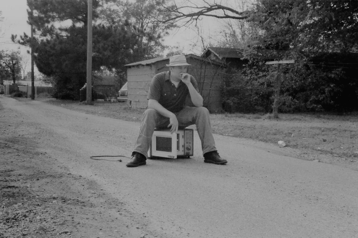 When I was 19, I fell in love with microwave ovens. I wrote a few stories and poems about them. Their knobs and their dings. I kind of forgot about that. Kate Bingaman-Burt found a few old photos of me recently from when we went to college together, and there I am sitting on one of those old microwaves. Things are different now. I fall in love with refrigerators now.