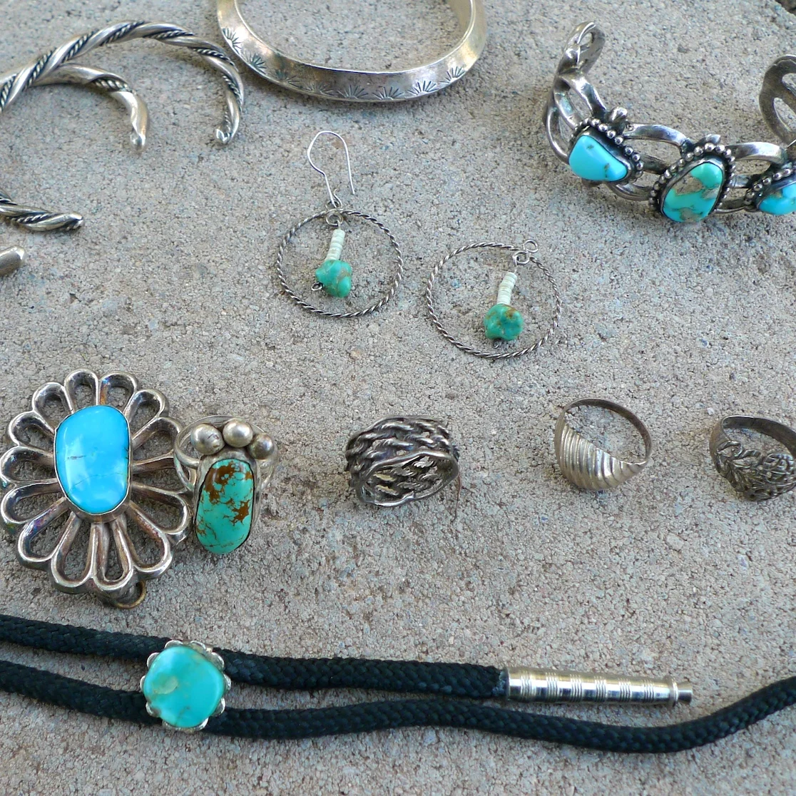 This month I was in Phoenix for a wedding and stayed with my grandma. I was showing off my new jewelry I made in my silversmith class and lo and behold the interest runs in the blood or something. These are pieces my grandma made in the 70’s from melting down silver dollars on a bunson burner. That little cuff in the upper right hand corner came home with me. amazing .