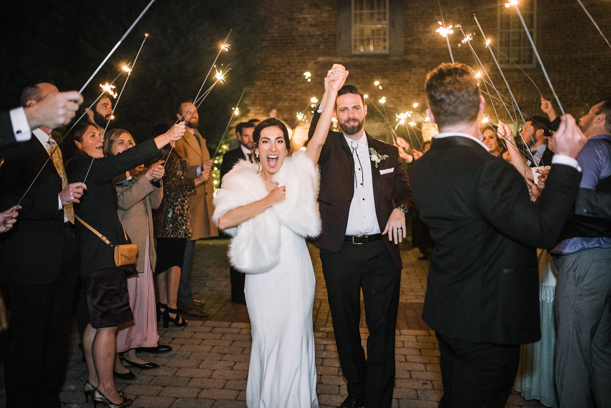 bride+and+groom+sparkler+exit+at+Birkby+House.jpeg