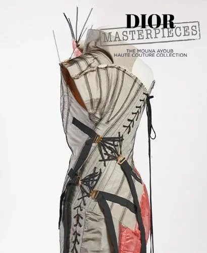 Image of a Dior by John Galliano dress hand painted in pink with black corset laces and visible stays from the Moun Ayoub couture auction at Maurice Kerry Taylor