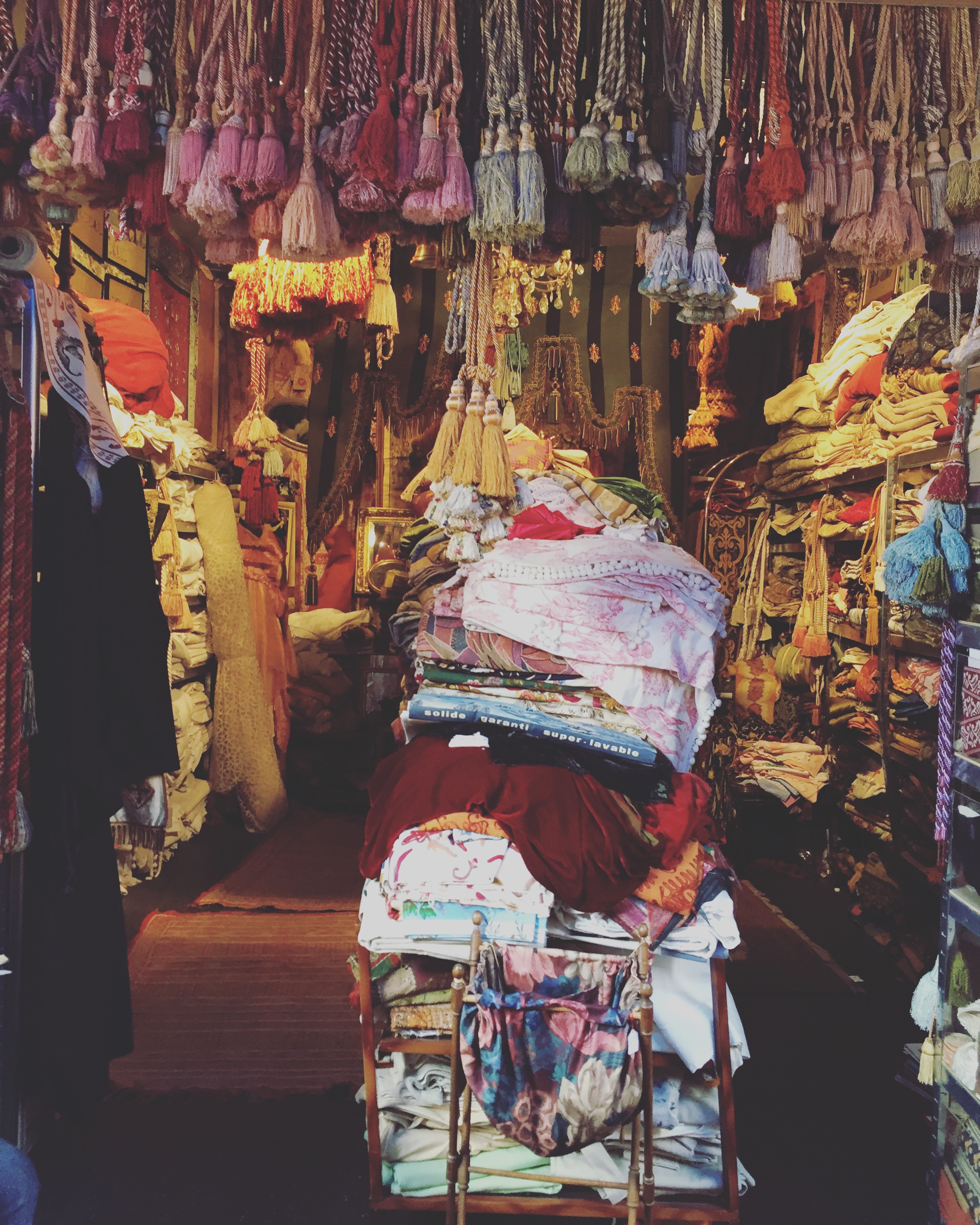 A stall selling vintage fabrics and trims