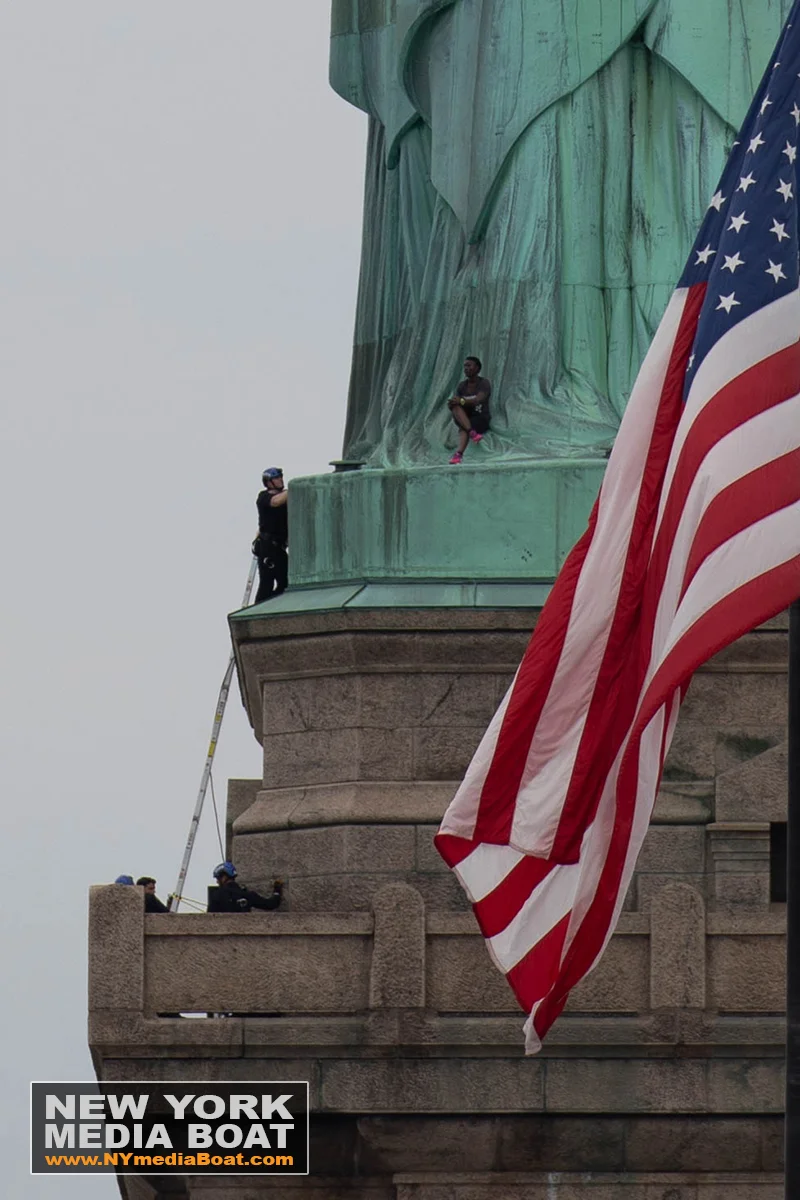 20180704_NYMB_StatueOfLiberty_climber-8377_wm.jpg