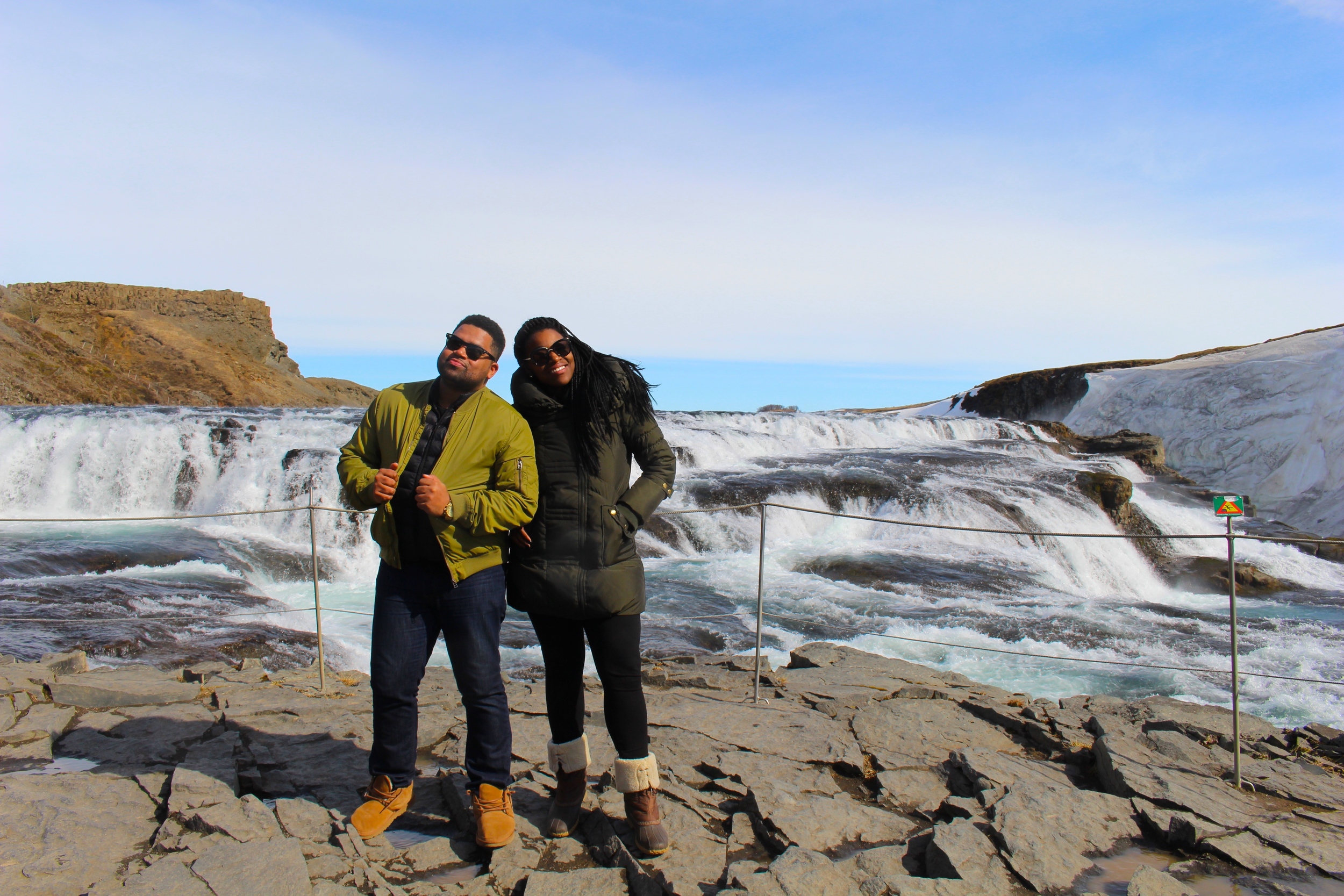 Hometown friends, Jasmine Muhammad and Gary Bushrod starting off an amazing Icelandic vacation at the Golden Waterfalls.