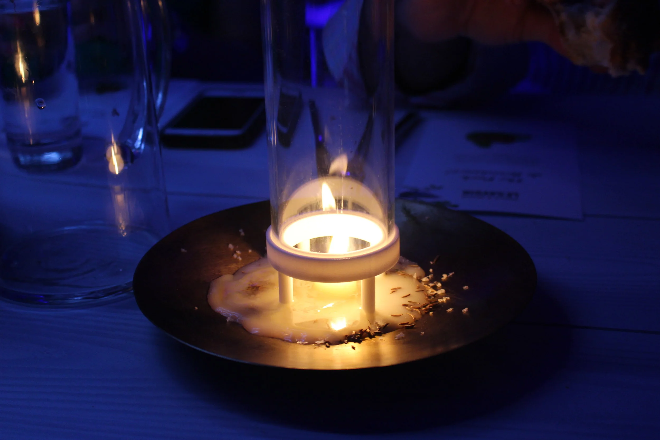 Beef tallow candles infused with caraway spice. This was used as a dip for the bread at dinner.