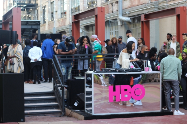Kitty Cash kept the block party poppin' from the DJ booth.