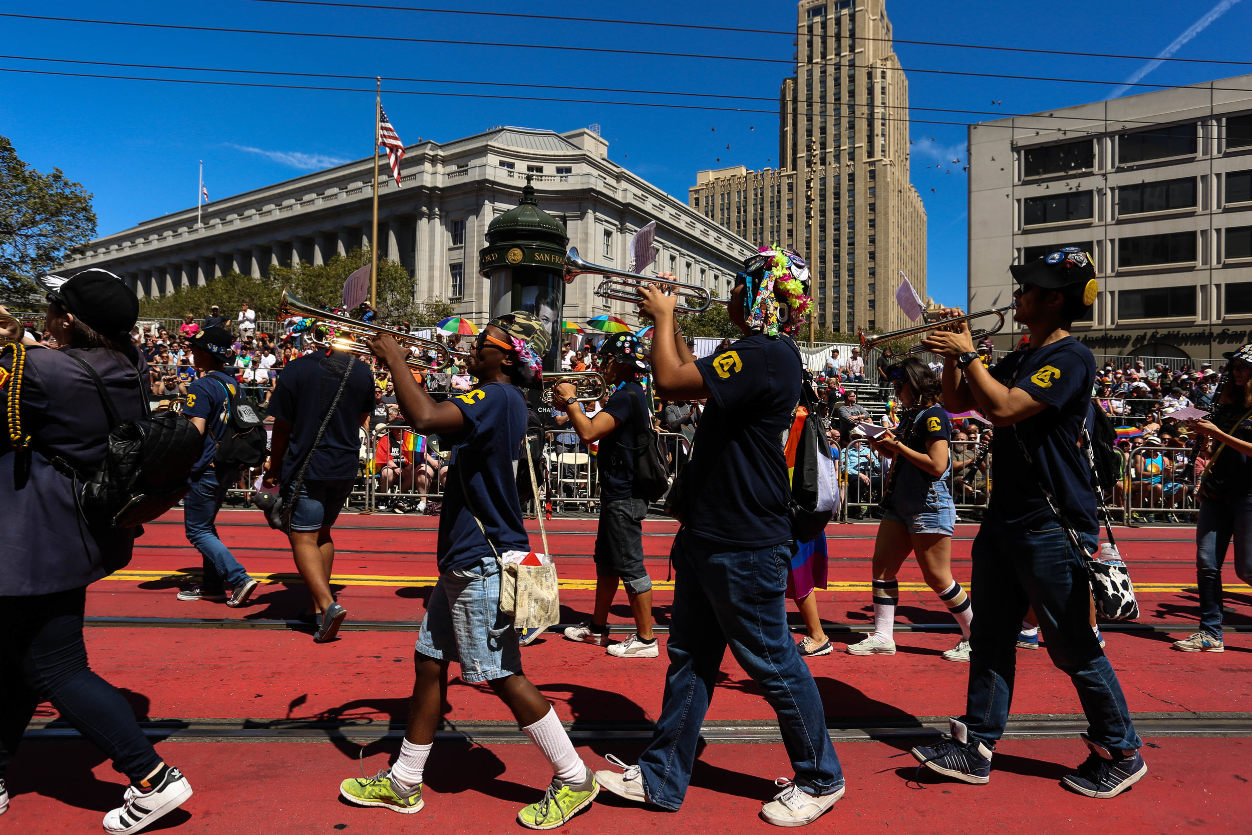 The California Aggie Marching Band stops to perform for the crowd as thousands gathered to celebrate Pride in San Francisco, Cali. Sunday, June 26, 2016.