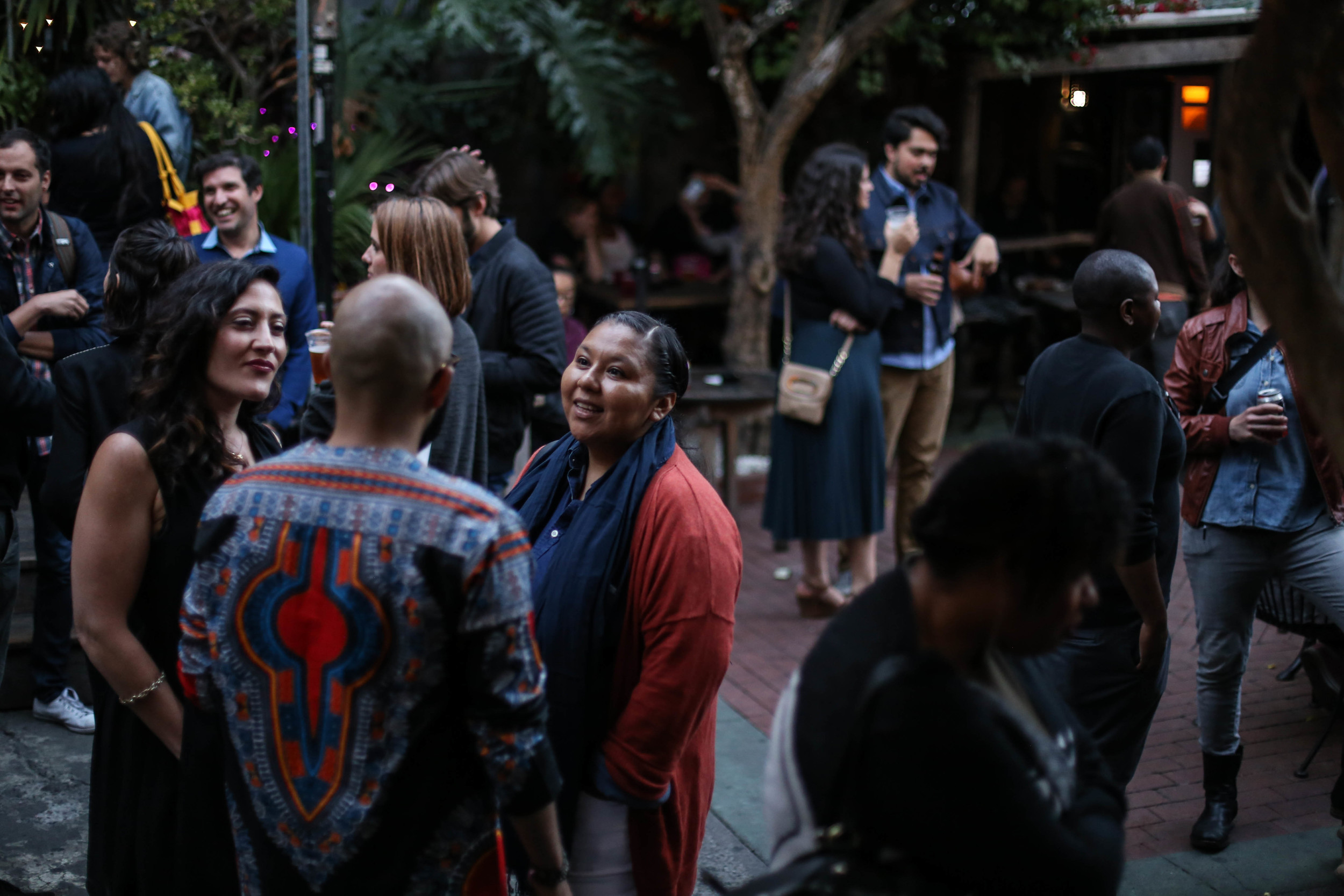 Krea Gomes, Edwin Lindo, and Orly Politi, San Francisco natives. Edwin saw the fire from his living room. When asked why he came to the fundraiser tonight he stated, "we need to help them start their lives again." San Francisco, California Thursday, June 30, 2016