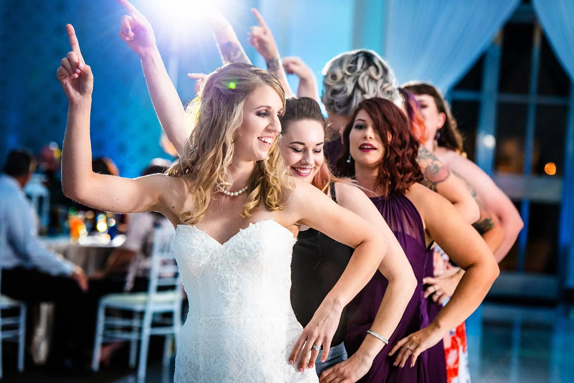 close-up bride dancing with girlfriends tampa wedding photograph