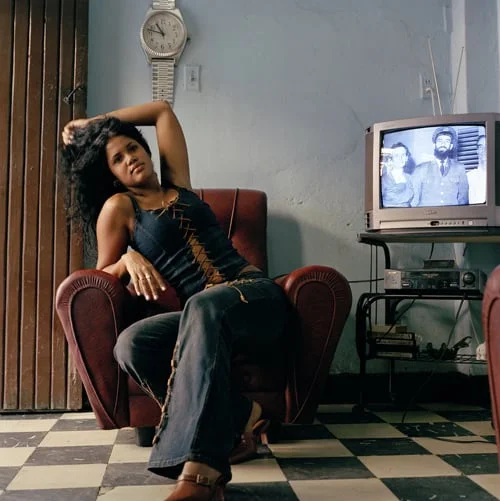 Woman and TV Set, Cuba. 2003.