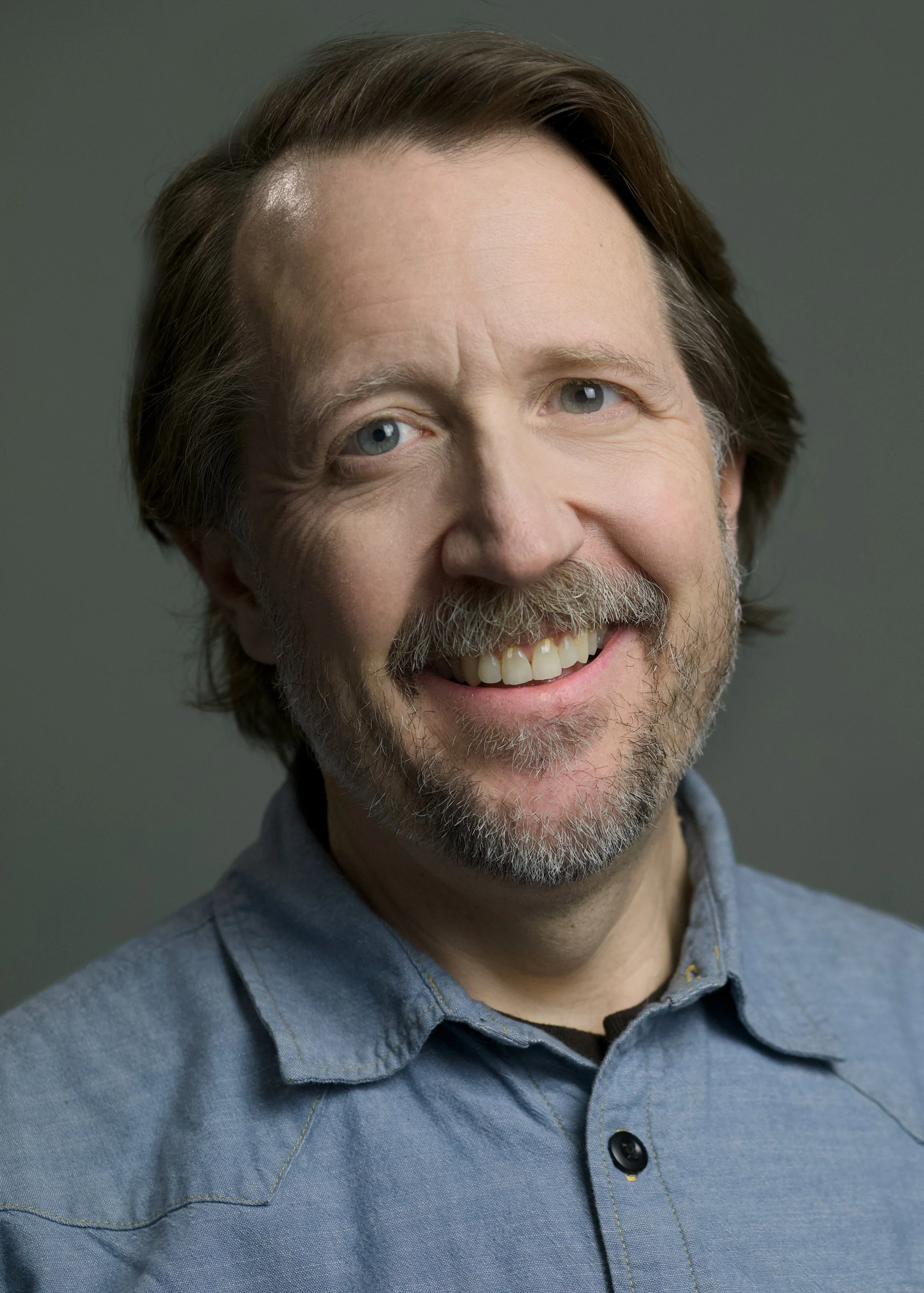 headshot image of Lance C. Fuller smiling
