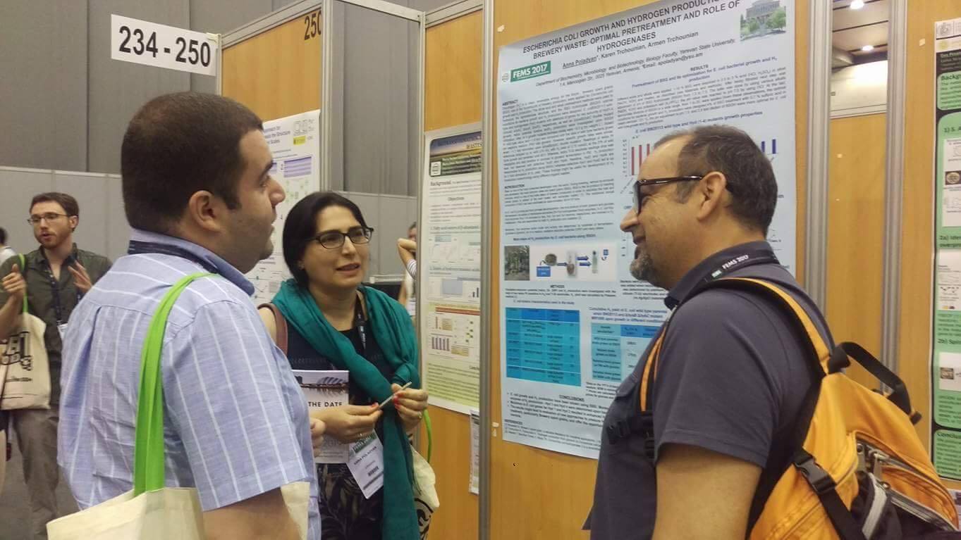 7. PI  Anna Poladyan with her colleagues discussing her abstract presented during the conference.jpg