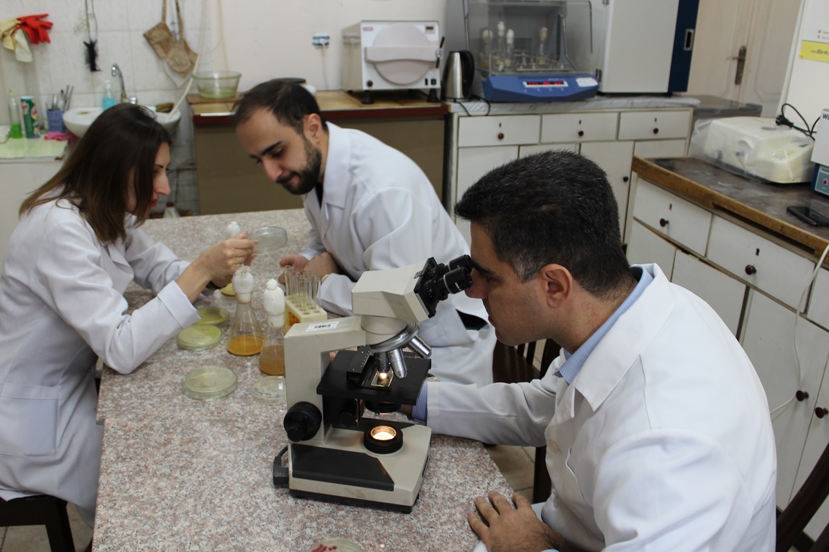 20.  ANSEF NS  microbio-4676 research group during work.JPG