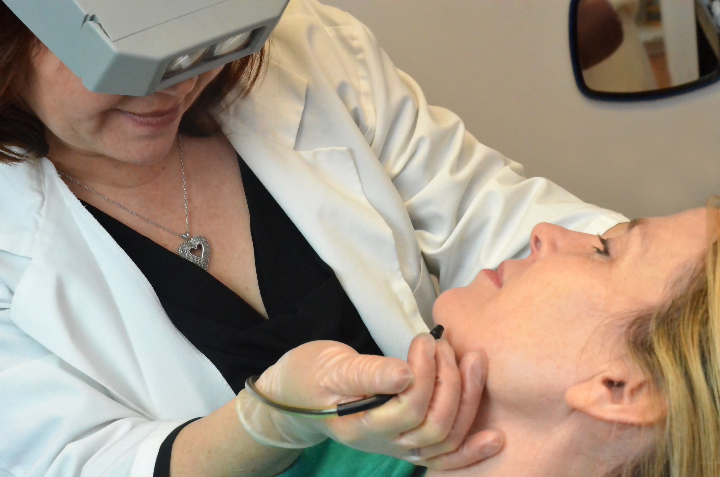 Teresa performs electrolysis on a client