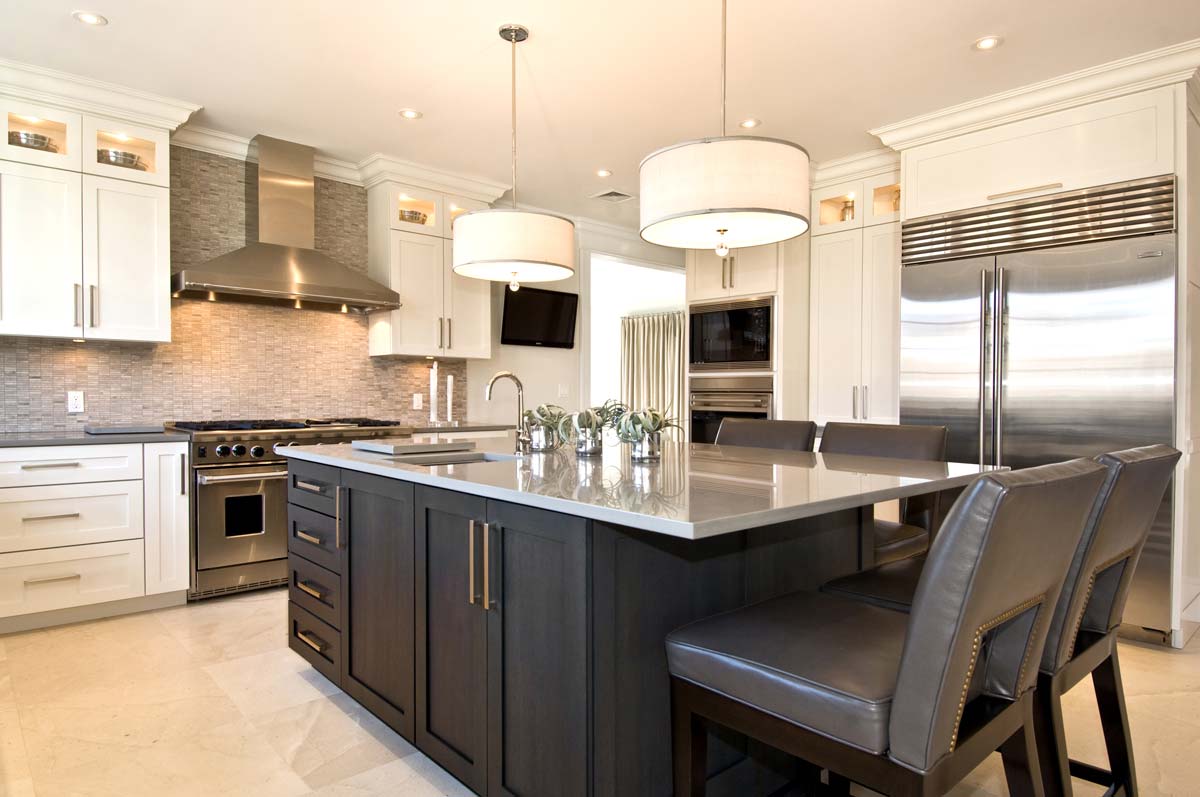 Notice the lit up spaces at the top of the cabinets. The owner wanted these to carry her collection of unique silver puture bowls, candlesticks, and more items.