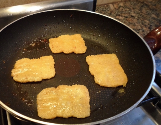 Reggianito (a hard variety) cheese in the pan.