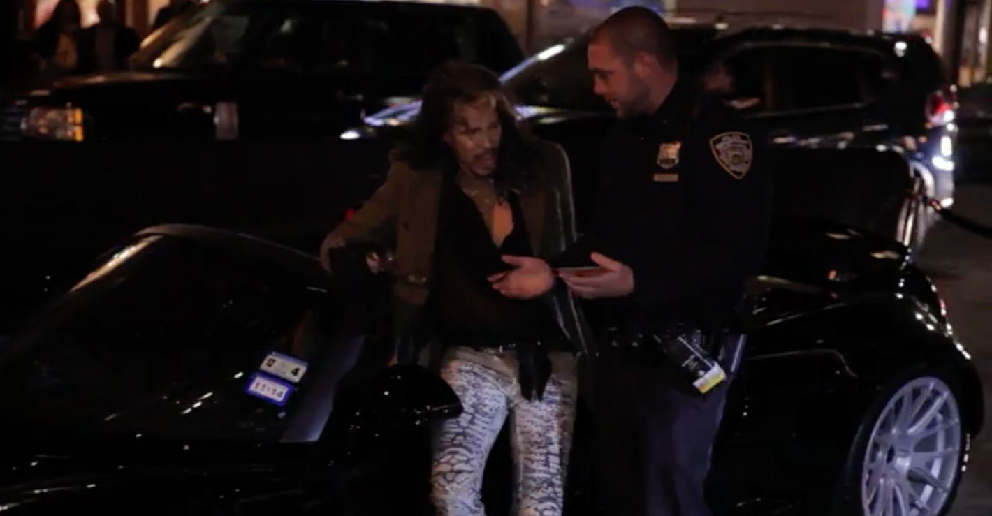 Tyler and NYPD in front of his Venom GT Spyder on 58th Street and Madison Avenue