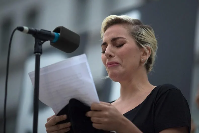 Lady Gaga at L.A. Vigil. Twitter @ladygaga - Photo by: David McNew/Getty Images 