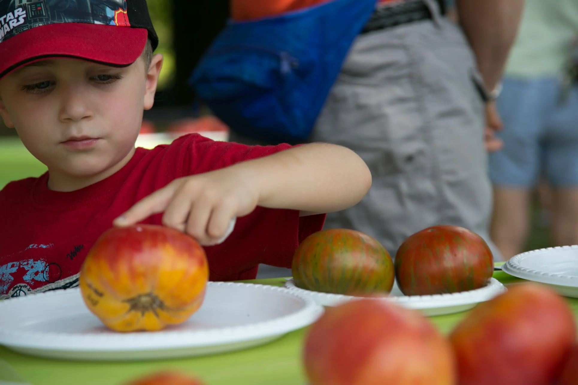 The joy of a tomato - taken at Tomatopalooza by Stephen Garrett