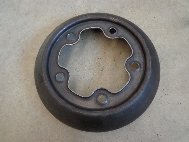 Steel alloy wheel center
