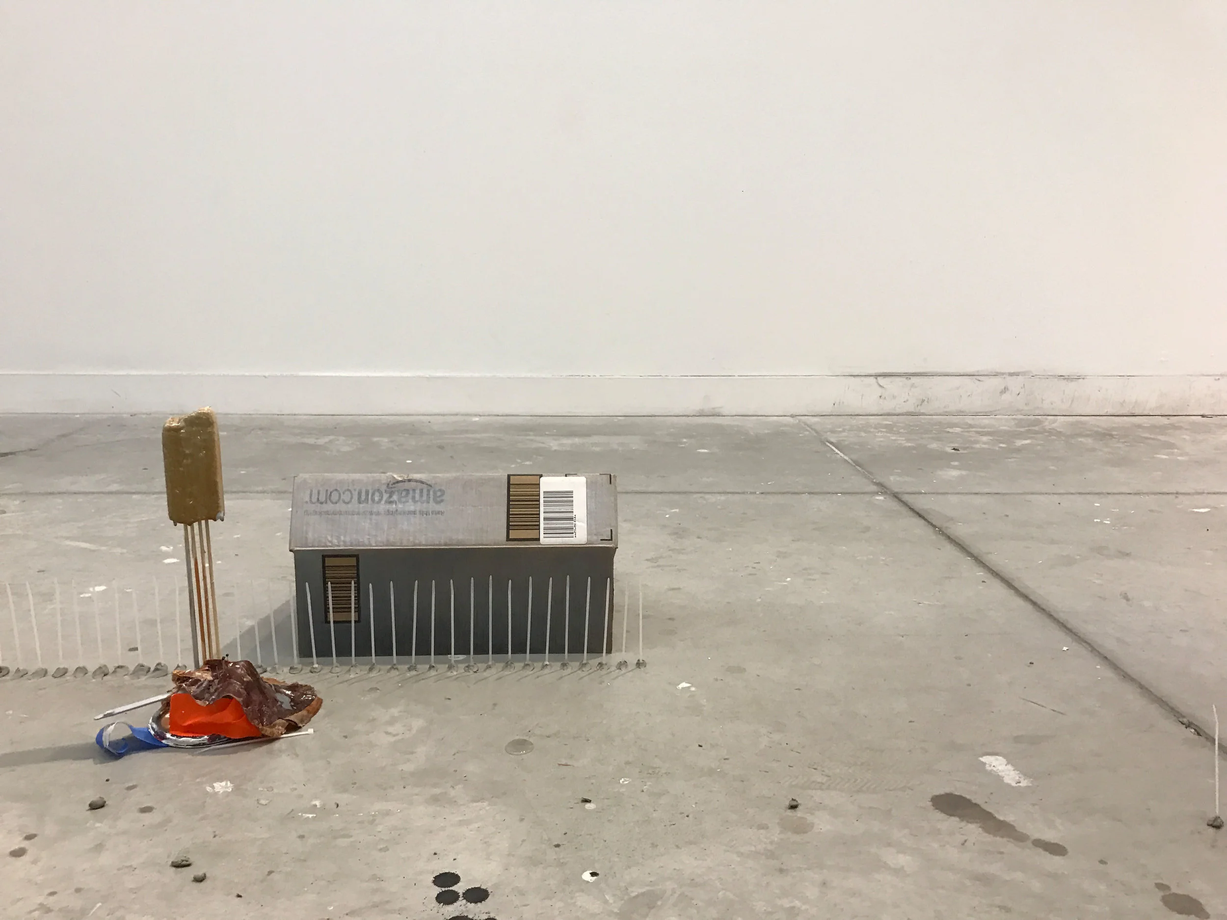 Cardboard, colored pencil, duct tape, paint, tape, plastercine, stir sticks, styrofoam, wooden skewers, zip ties.