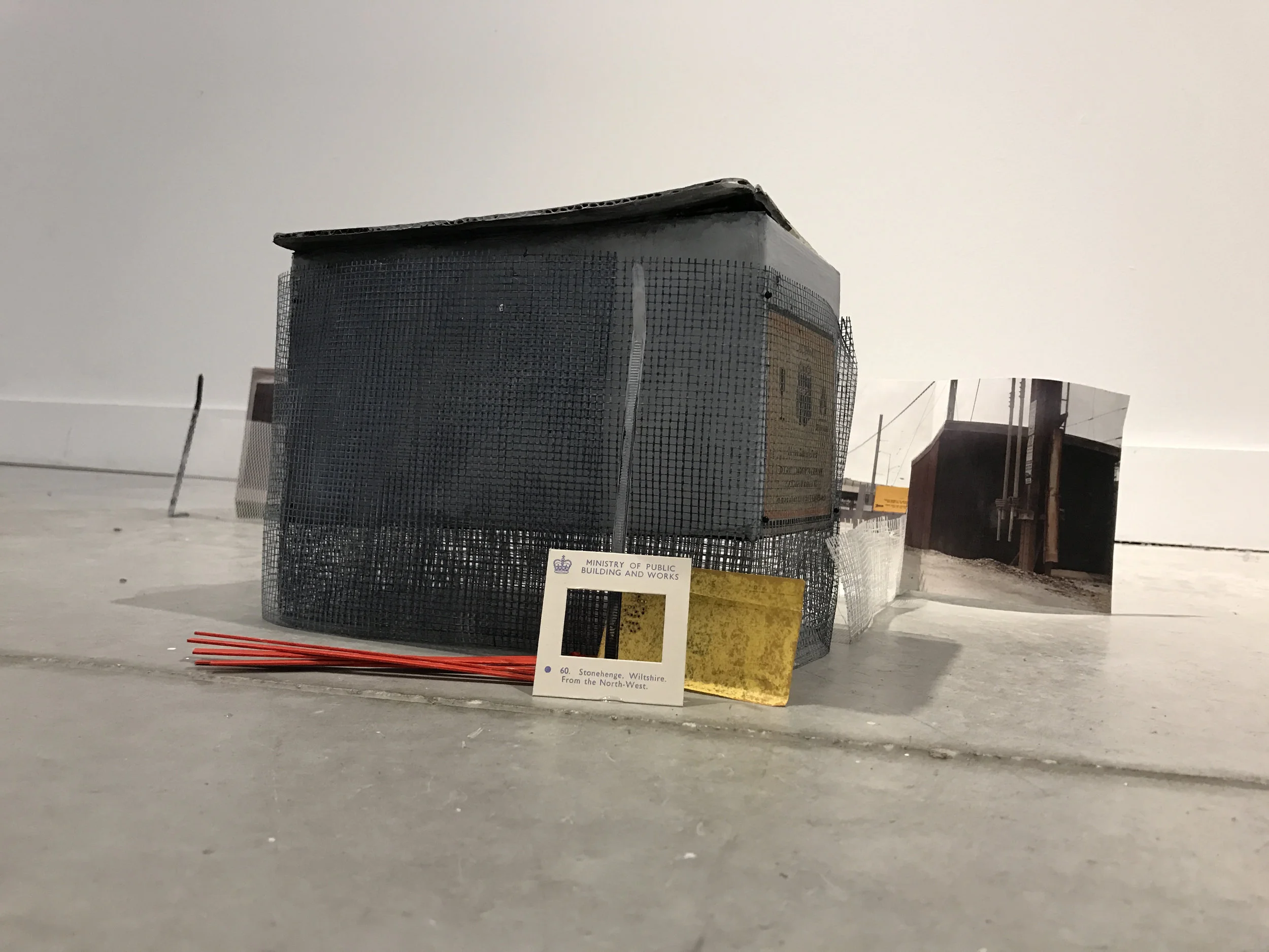  2017. Cardboard, paint, photographs, plastic mesh, slide holder, stir sticks, styrofoam, zip ties. 