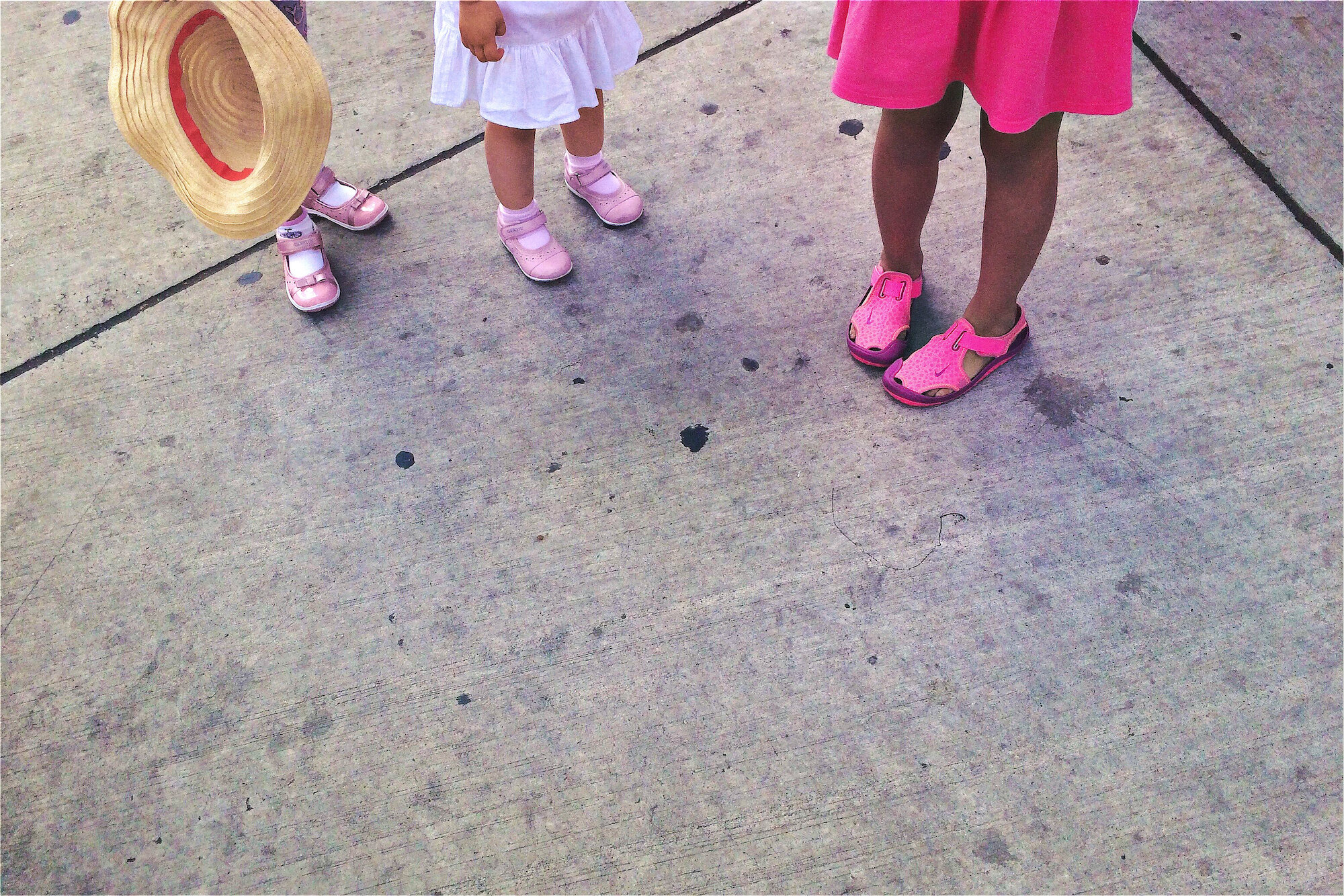 three girls with pink shoes