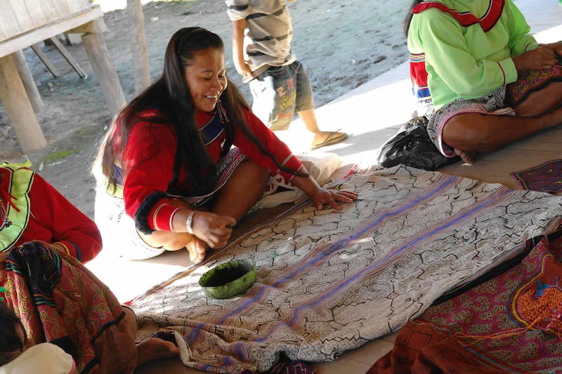 Shipibo Lady with Textiles.JPG