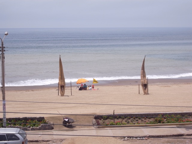 Huanchaco, La Libertad - Reed Boats and Sunbathers.jpeg